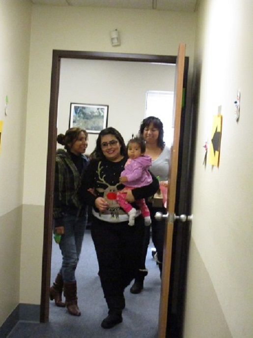 Nancy holding a baby